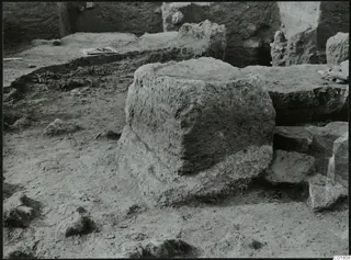 Large stone block, the altar, in an excavated area at Ayia Irini, seen from the east