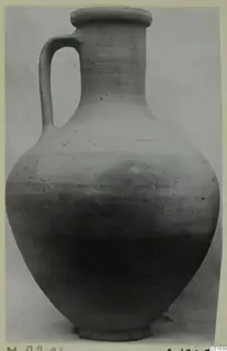 Jug of Pottery Plain White VII with a single loop handle and a ring base