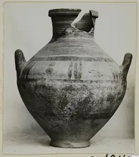 White Painted V two-handled jar from Marion, with part of the neck broken away