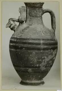 Pottery jug with a spout, loop handle and dark painted bands, from Marion