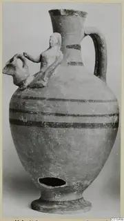 Pottery jug from Marion with a modelled figure and an animal head on the shoulder and dark painted bands