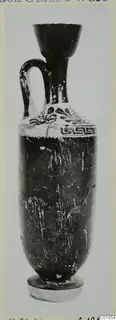 Black Glazed Ware lekythos with one handle, a flared mouth and a white band with dark motifs and a key pattern near the shoulder.