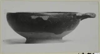 Shallow bowl with a horizontal handle and a short ring foot, from Marion, tombs 46–60