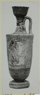 Lekythos, a white-ground pottery flask with dark painted fan motifs and a key pattern band