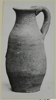 Pottery Plain White VII jug with a flared rim and a single strap handle