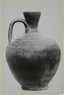 Jug in Pottery Stroke Polished Ware with a single loop handle, from Marion