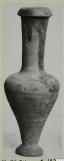 Cypro-Hell.I. pottery: tall vessel with a narrow neck, flat disc-shaped top and ring foot, shown against a plain background