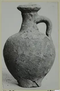 Pottery Plain White VII, a round-bodied jug with a single strap handle and a broad flat mouth