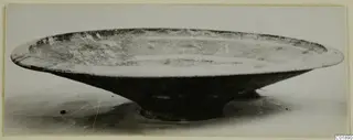 Bichrome-Red bowl from Marion, shown in side view on a pale surface