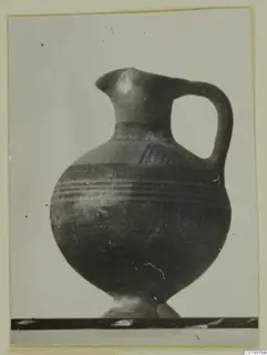White Painted I jug from Lapithos, with a single handle and horizontal banded body