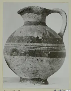 White Painted I jug from the Kastros tombs at Lapithos, with banded decoration and a strap handle