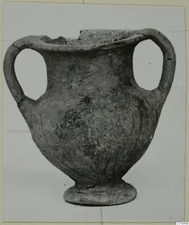 Two-handled pottery vessel with a broken rim, from the Kastros tombs at Lapithos