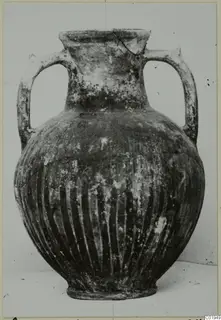 Black Slip Ware two-handled vessel with vertical ribbing, from the Lapithos Kastros tombs