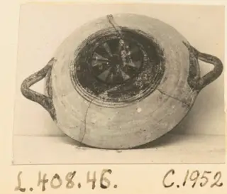 Pottery White Painted I bowl from Lapithos, seen from above, with two loop handles and dark painted bands inside