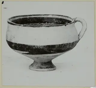 White Painted I bowl from Lapithos, Kastros tombs: a footed bowl with one loop handle and a dark painted band