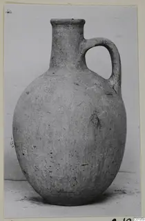 Pottery jug with a single loop handle and tall neck, from the Kastros tombs at Lapithos