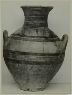 Pottery Bichrome II two-handled jar from Lapithos, Kastros tombs, with painted bands and hatched motifs on the shoulder