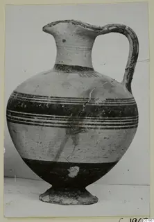 White Painted I jug with a single loop handle and dark painted bands, from the Lapithos Kastros tombs