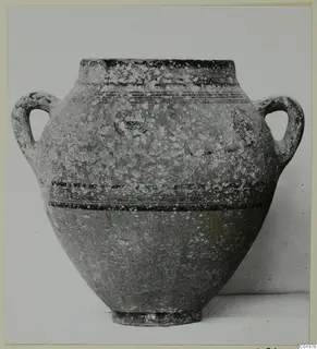 Two-handled pottery jar with dark painted bands and concentric circle motifs, from the Kastros tombs at Lapithos