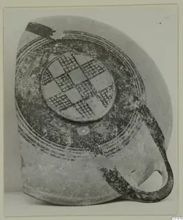 White Painted I bowl from Lapithos, Kastros tombs, with a checkerboard medallion and concentric painted bands