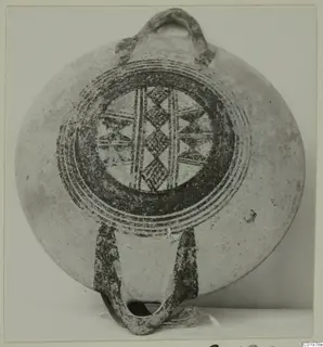 Pottery White Painted I bowl from Lapithos, Kastros tombs, with painted concentric rings and a central cross-hatched pattern