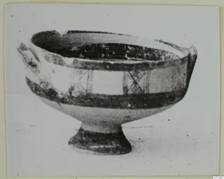 Pottery White Painted I bowl from Lapithos, a footed bowl with dark painted bands around the body