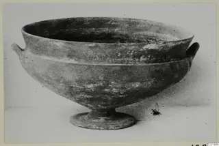 Footed bowl with two small horizontal handles on a plain background, Foreign Red Slip
