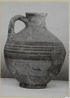 Jug with a looped handle and dark horizontal bands on the body, White Painted I - II pottery