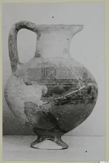 White Painted jug with a loop handle and painted bands, from the Kastros tombs at Lapithos