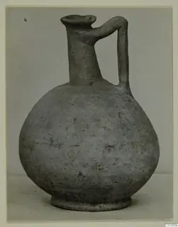 Pottery Plain White VII: globular jug with a tall neck and a single strap handle