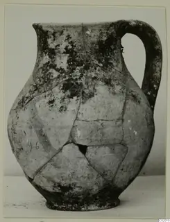 Pottery jug from Vouni, Black Slip I-VI, mended from several fragments, shown in side view