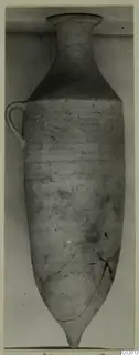 Pottery Plain White VI vessel (V.3.14) with a single loop handle, shown upright