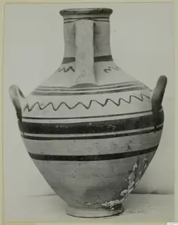Pottery White Painted VI jar with dark painted bands, zigzag lines on the shoulder, and three handles