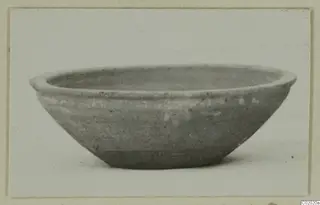 Pottery Plain White VII bowl, side view on a plain background