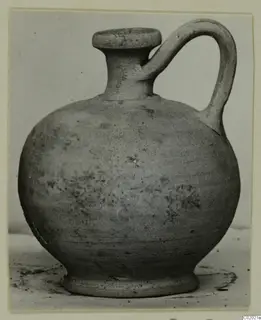 Pottery jug, Plain White VI, with a round body, flat-topped rim and single loop handle