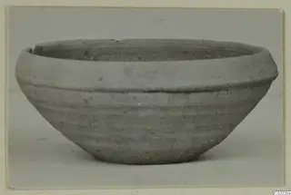 Pottery Plain White VII bowl, a plain wheel-made bowl with a thick rim and a band of grooves.