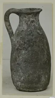 Pottery Plain White VII jug with a single loop handle, from Vouni
