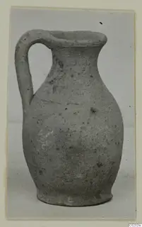 Pottery Plain White VII, a single-handled jug with a narrow neck and rounded body, photographed against a pale background