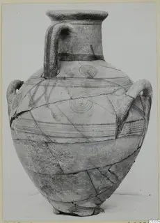 Pottery White Painted IV jar with strap handles, dark banded decoration and concentric circles