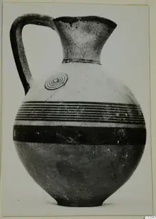 Jug with a loop handle, dark horizontal bands and a concentric-circle motif on the shoulder, from Marion