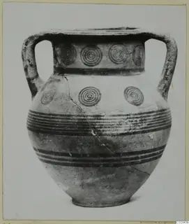 Two-handled amphora decorated with black concentric circles and horizontal bands