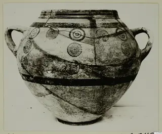 Two-handled pottery vessel with dark painted horizontal bands and concentric circle motifs, White Painted IV