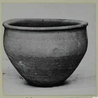 Pottery Plain White VII, a wide plain bowl with a thick rounded rim, photographed alone on a pale surface