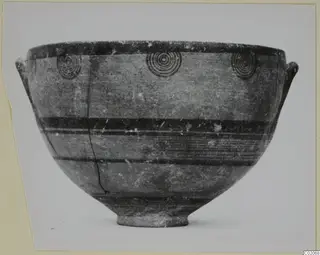 Bowl of Pottery Black-on-Red I-III, M.4.2, with concentric-circle motifs and dark horizontal bands