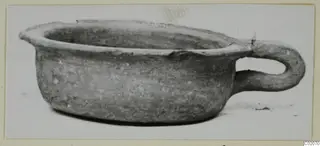 Pottery bowl with a single loop handle, from the Marion tombs, seen from the side