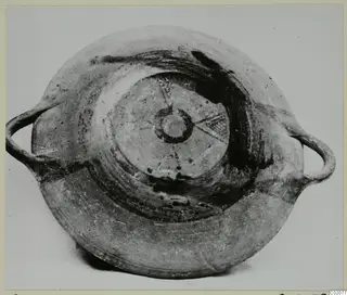 White Painted I bowl from Lapithos, photographed from above, with two loop handles and dark painted bands inside.