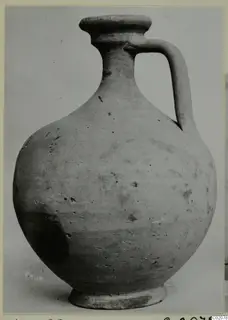 Pottery Plain White VII jug with a single loop handle and a flared rim