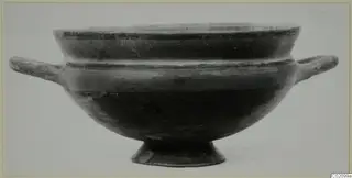 Pottery bowl with two horizontal handles and a short foot, shown in side view against a plain background