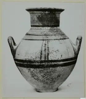 Pottery Bichrome V amphora, a two-handled jar with dark painted bands, photographed against a plain background.