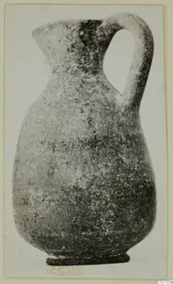 Pottery jug with a single loop handle and a narrow neck, catalogued as Black-on-Red II-IV